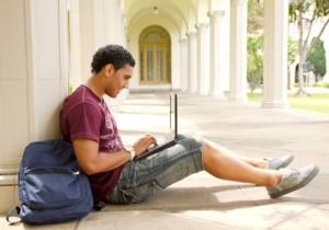Male college student on notebook